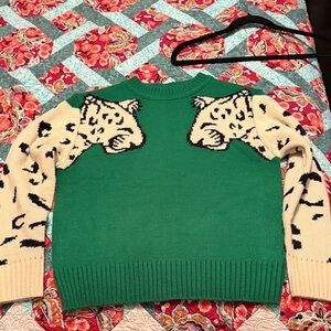 Amazon Green Sweater with Leopard Design